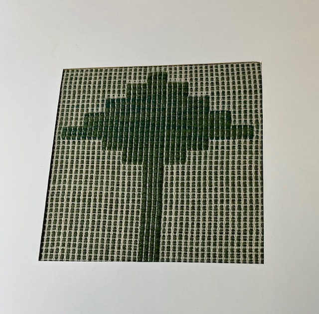 Modernistic small weaving of a tree in shades to cream and dark green.