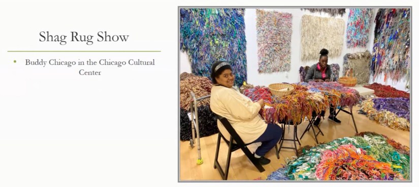 Slide showing an image of two women sitting amidst a display of many colorful shag rugs