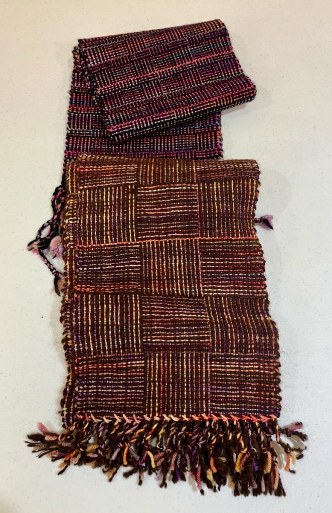 Log cabin scarf in various solid and variegated colors.