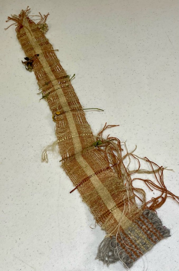 Small brown and beige woven strip.