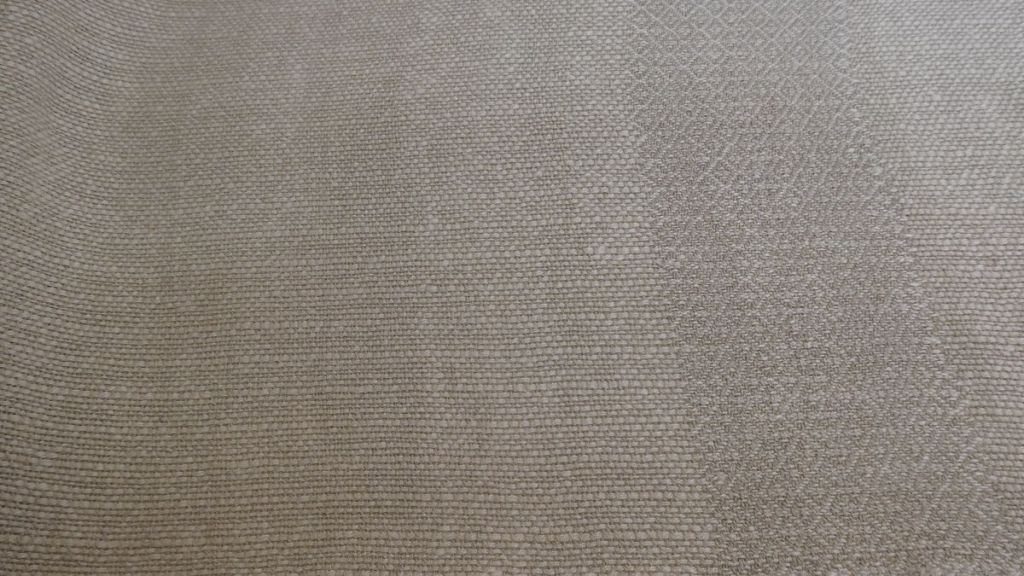 Gay A., white table runner close up showing the two types of weaving patterns that she used.