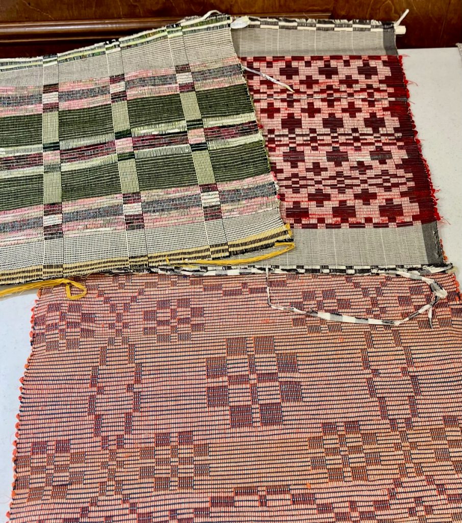 Lengths of fabric in multiple colors and styles.