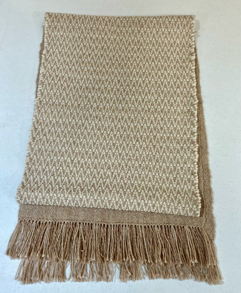 Pam S. - scarf using alternating colors of chevron shapes.