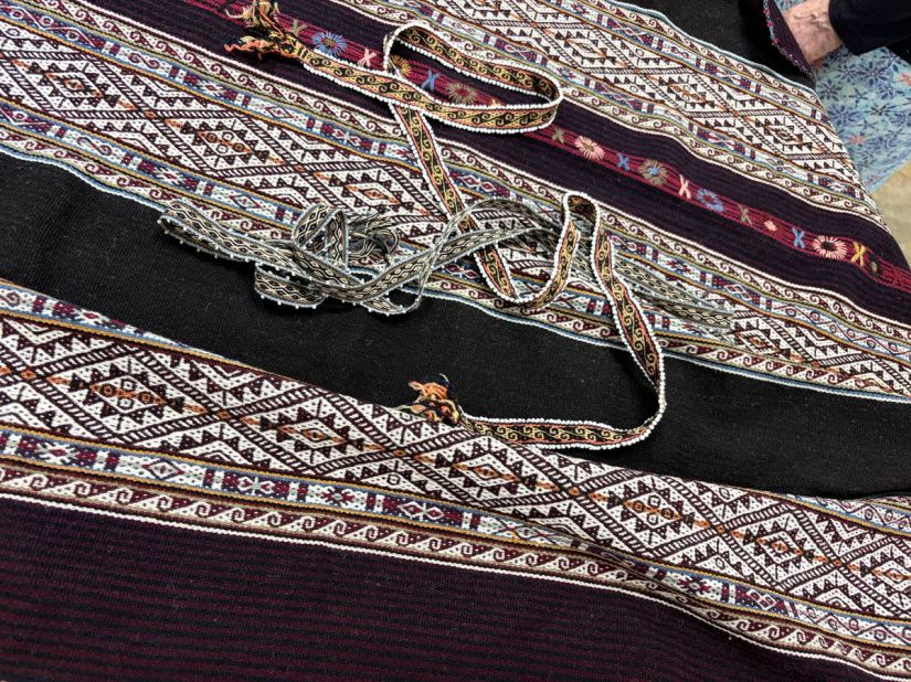 Handwoven bands and fabric incorporating handwoven and hand-embroidered bands